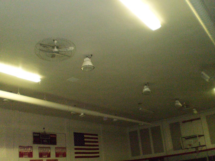 Ceiling lights and fan in a commercial building